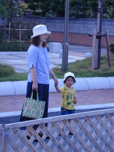 Young mother walking with child